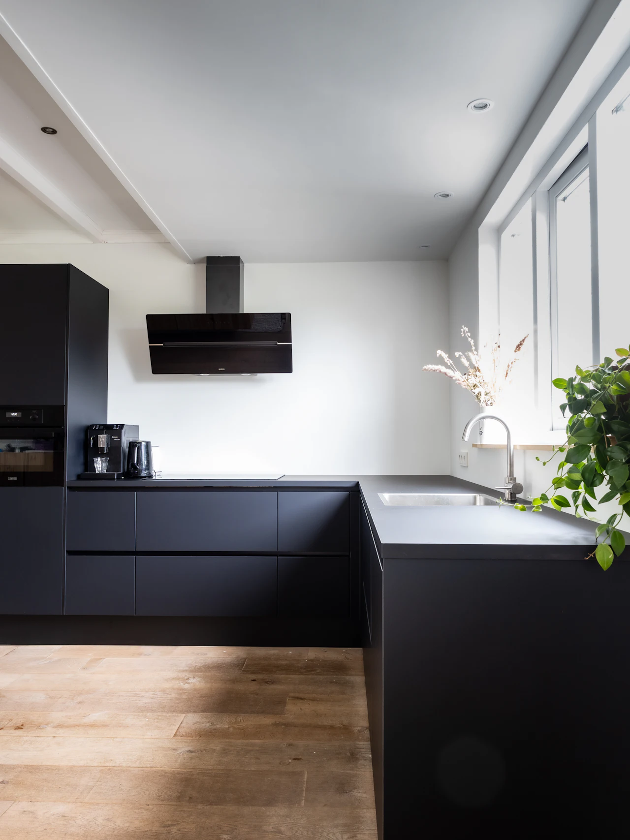 Matte black handleless kitchen